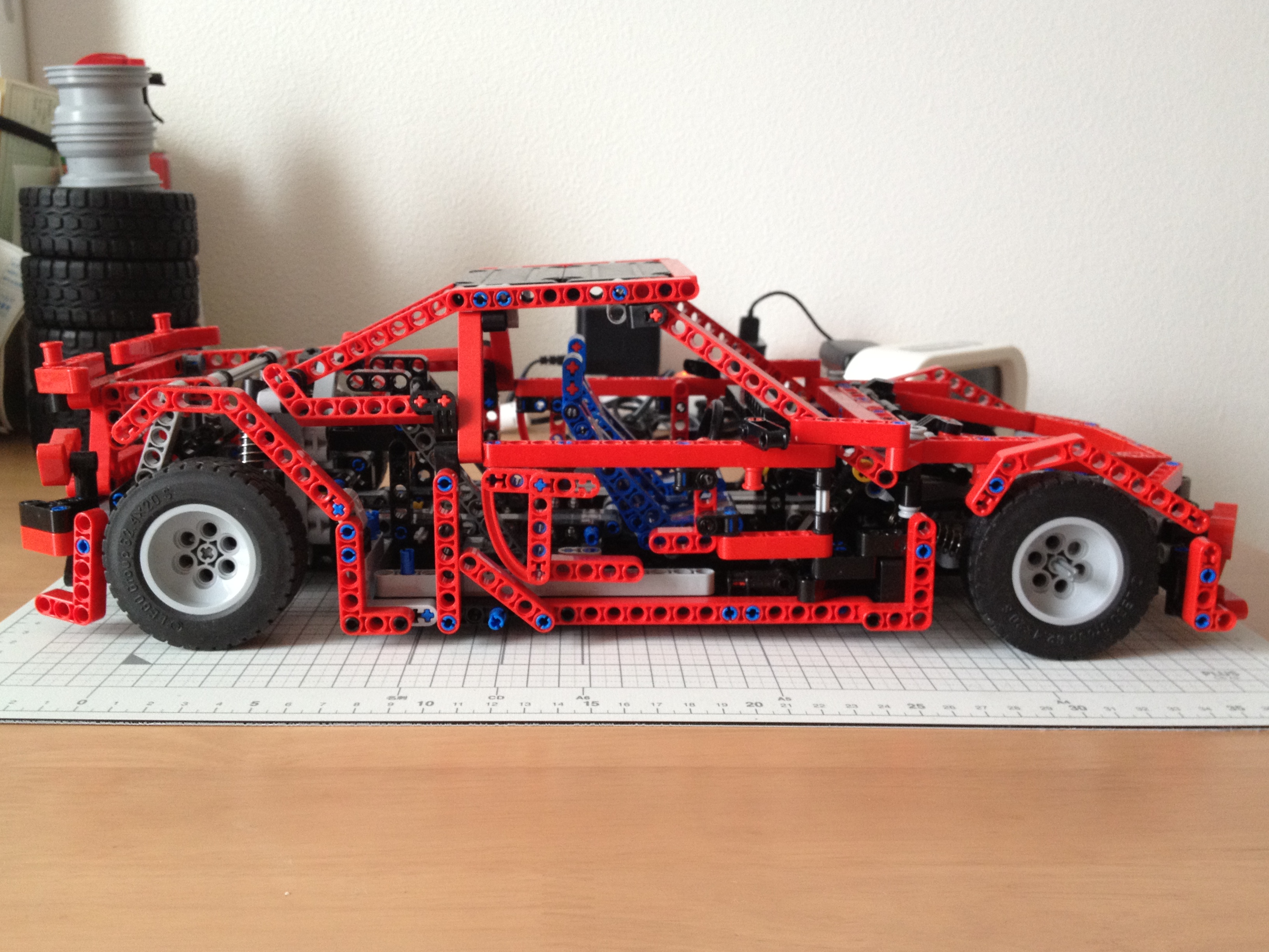 Photograph of a red custom Technic-style brick-built car